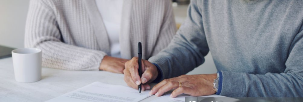 Cropped shot of a senior couple meeting with a consultant to discuss paperwork at home